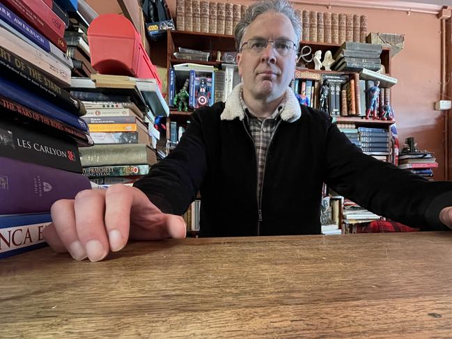 Lattes vs literacy: Books by the Bay owner Leonid Kouvelis at his shop at 725 Esplanade, Mornington. Picture: Lucy Callander