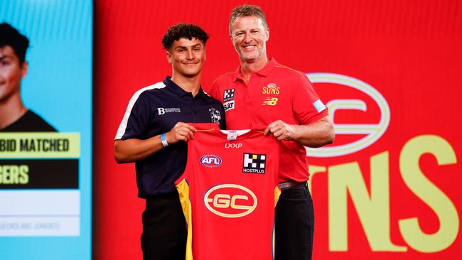 Jake Rogers with Damien Hardwick after being selected at number 14 during the 2023 AFL Draft. Picture: Michael Willson/AFL Photos via Getty Images.