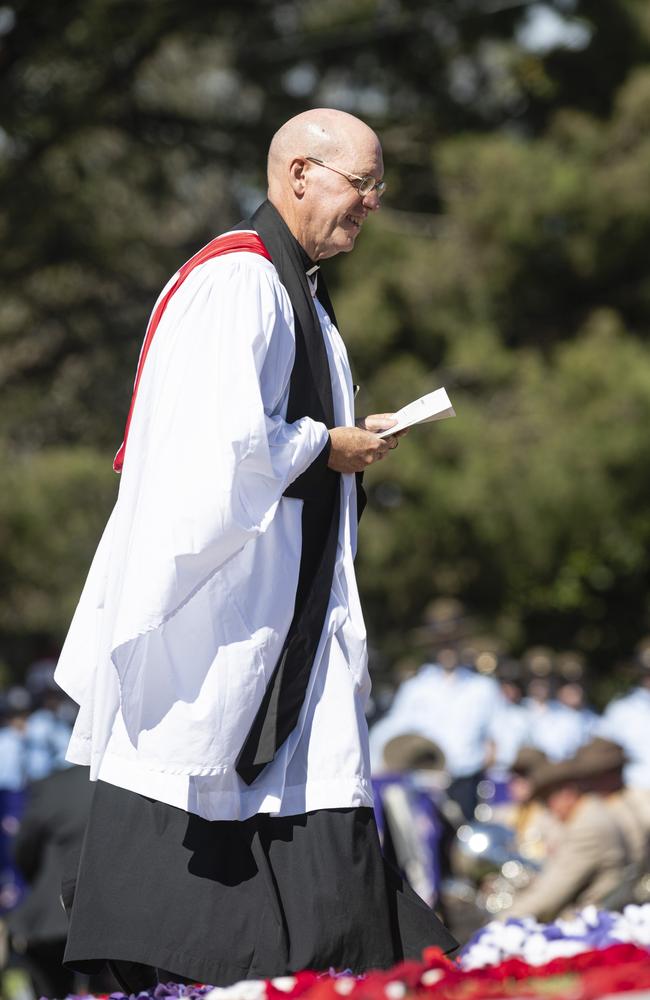 Army chaplain Major Andrew Osborne prepares to lead Toowoomba's Anzac Day mid-morning service in prayer at the Mothers' Memorial, Thursday, April 25, 2024. Picture: Kevin Farmer