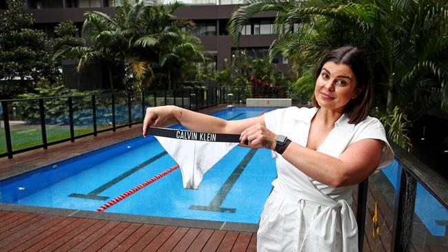 Kristy Miller says she was embarrassed when asked by building security guards to wear shorts and cover up her skimpy bikini bottoms. Picture: Toby Zerna