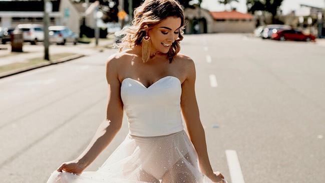 A Gold Coast wedding designer has released a number of sexy see-through styles after experiencing growing demand from brides for the look. Vanessa Haldane models the Gypsy Pearl skirt in Southport. Photo: Chantelle Davies.