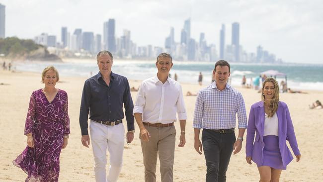 LNP Gold Coast MPs celebrate their victory on Burleigh Beach, L-R Ros Bates, John-Paul Langbroek, Hermann Vorster, Sam O'Connor and Laura Gerber. Picture: Glenn Campbell