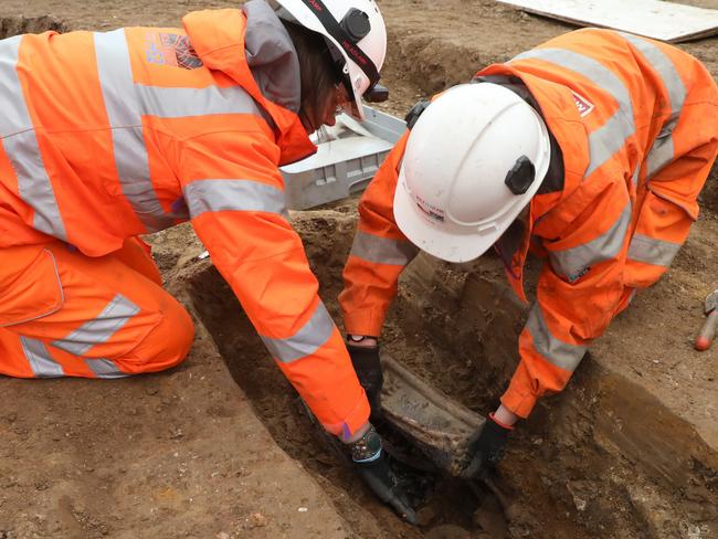 Archaeological workers at the dig site. 