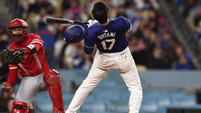 Shohei Ohtani, who won’t pitch until next year due to injury, ducks a high ball from LA Angels’ Reid Detmers on Monday during the fifth inning at Dodger Stadium. Picture: Michael Owens/Getty Images