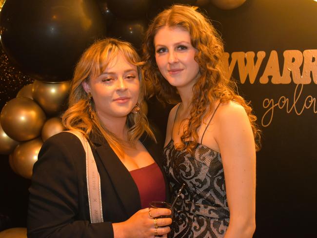 Abbey Pleydell and Annie Bass having a great night at the Cowwarr Saints Football &amp; Netball Club Golden Gala Ball 2024. Picture: Jack Colantuono