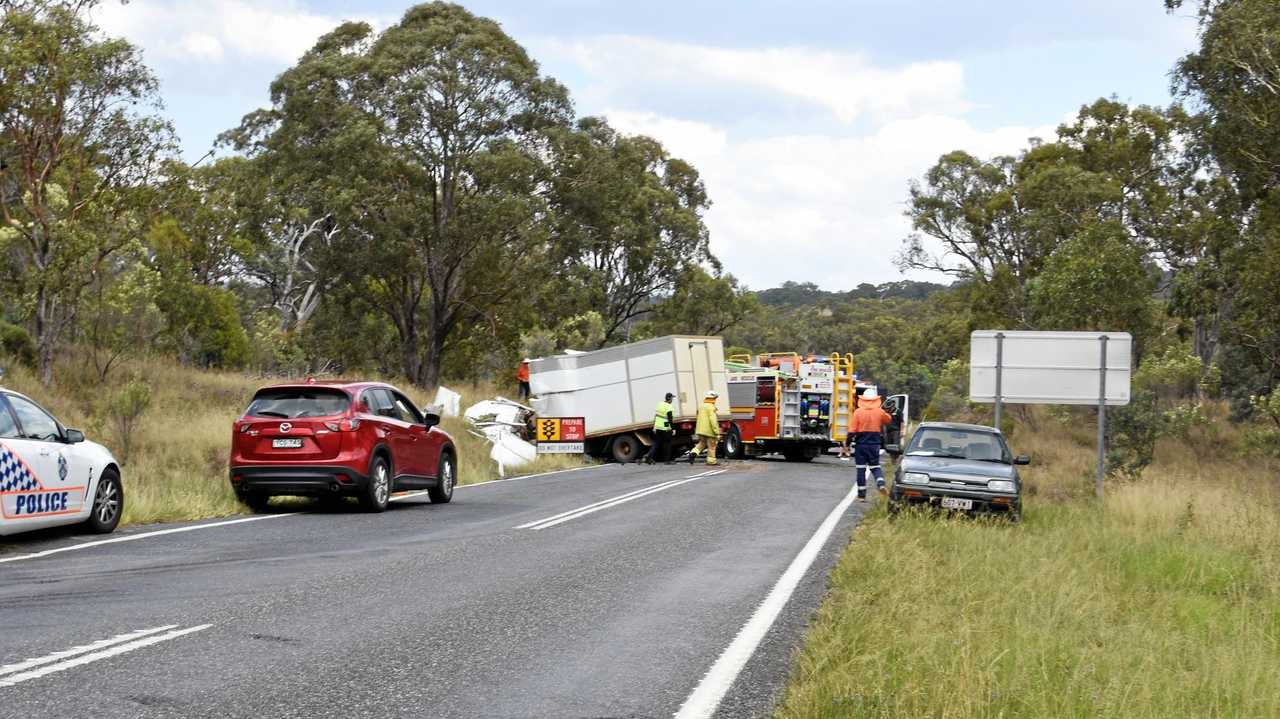 New England Highway is blocked after a serious traffic crash between two trucks and a four-wheel drive. Picture: Elyse Wurm