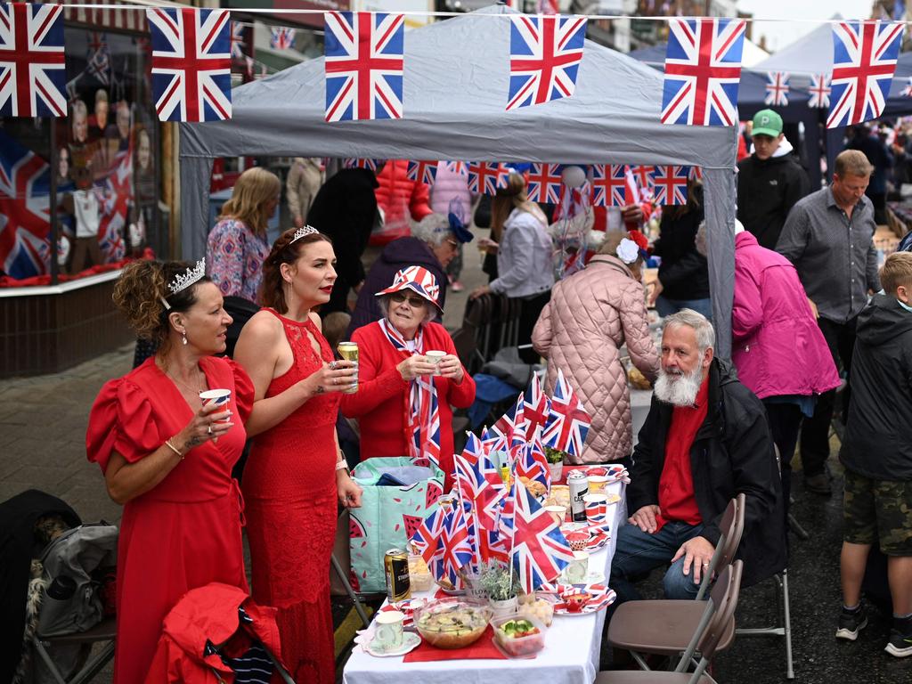 Revellers attend a street party in Ashby-de-la-Zouch in central England. Picture: AFP