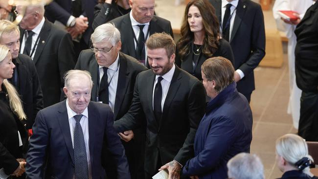 Beckham leaves with the other mourners. Photo by Adam Ihse/TT / various sources / AFP