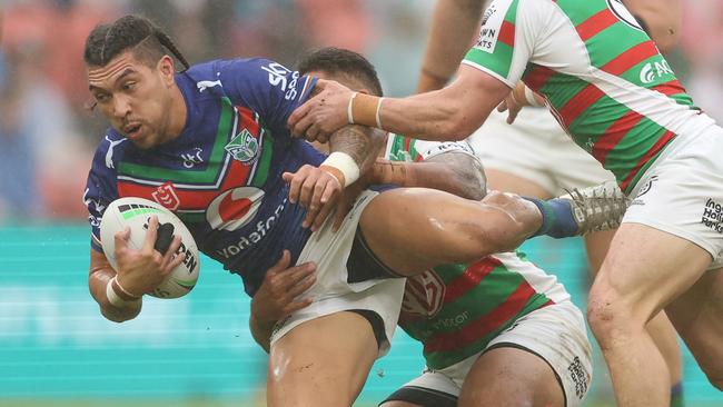 BRISBANE, AUSTRALIA - MAY 14: Aaron Pene of Warriors is tackled during the round 10 NRL match between the New Zealand Warriors and the South Sydney Rabbitohs at Suncorp Stadium, on May 14, 2022, in Brisbane, Australia. (Photo by Chris Hyde/Getty Images)