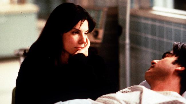 Actors Sandra Bullock &amp; Peter Gallagher in While You Were Sleeping.