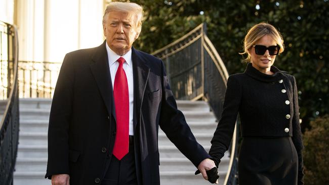 Donald Trump and wife Melania exit the White House on January 20. Picture: Bloomberg via Getty Images