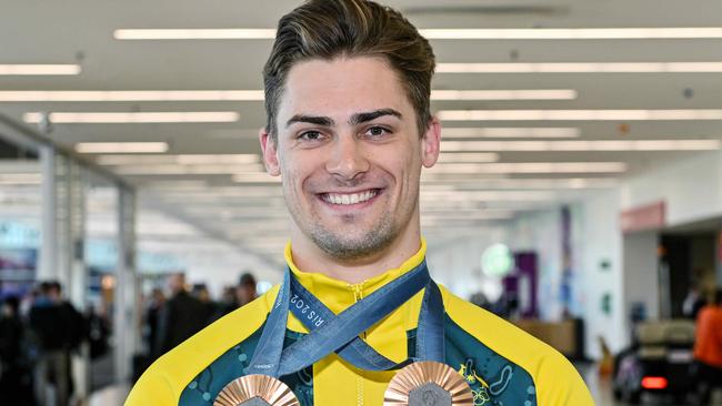 ADELAIDE, AUSTRALIA - NewsWire Photos AUGUST 14, 2024: South Australian Olympic cyclist Matthew Glaetzer arrives home with his two bronze medals at Adelaide airport. Picture: NewsWire / Brenton Edwards