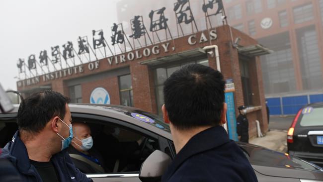 Members of the World Health Organization (WHO) team investigating the origins of the COVID-19 coronavirus arrive by car at the Wuhan Institute of Virology. Picture: AFP