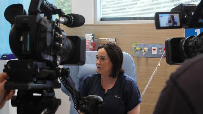 Nurse unit manager Clare Scullion gets the first Covid-19 vaccine administered at Coffs Harbour hospital's vaccination hub. Photo: Tim Jarrett / Coffs Coast Advocate