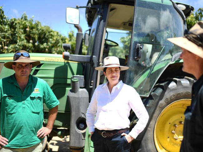 BOWEN, AUSTRALIA - NewsWire Photos - OCTOBER 26, 2020.Queensland Premier Annastacia Palaszczuk talks to farmers during a visit to Marto's Mangoes orchard and packing facility near Bowen. Ms Palaszczuk announced cuts to irrigation prices for farmers should Labor wins government on October 31.Picture: NCA NewsWire / Dan Peled