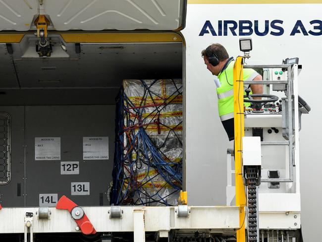 The first shipment of Pfizer COVID-19 vaccines is unloaded. Picture: Bianca De Marchi/AAP Image