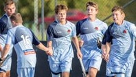 Winners are grinners at the hockey championships at Bathurst.