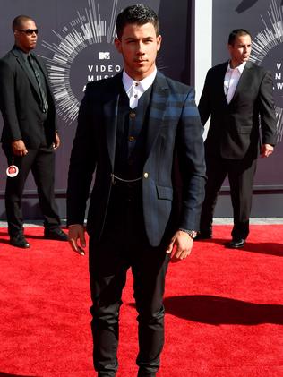 Nick Jonas attends the 2014 MTV Video Music Awards.