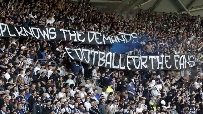 Before kick off fans show their disappointment about Australian Professional Leagues’ decision to give the A-League grand final to Sydney for the next three years.