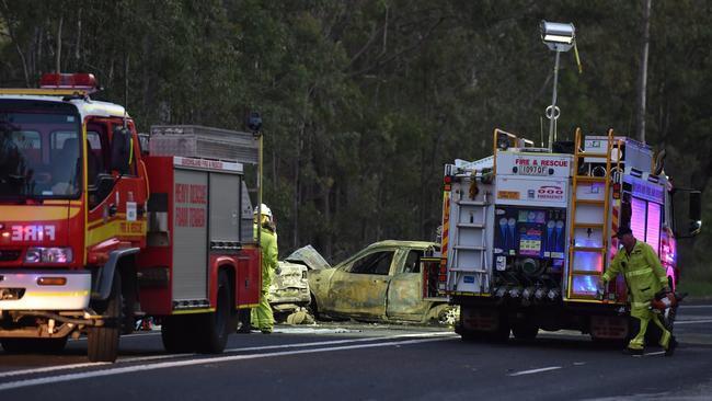 Emergency workers at the scene of a double fatality on the Bruce Highway near Tiaro on April 17, 2017. Picture: Alistair Brightman