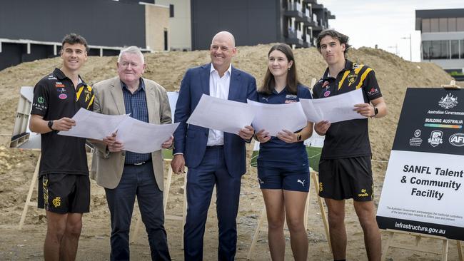 (L to R) Lucas Camporeale (Glenelg), Rob Kerin (SA Football Commission Chairman), Darren Chandler (SANFL CEO), Esther Schirmer (South Adelaide), Ben Camporeale (Glenelg). Picture: SANFL/Roy Vandervegt