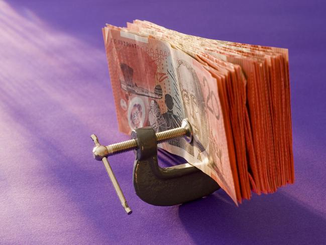 a wad of australian 20 dollar notes pressed in a G clamp, vice, money, generic