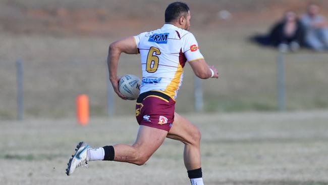 Tim Simona races away to score Thirlmere’s first try. Picture: Steve Montgomery