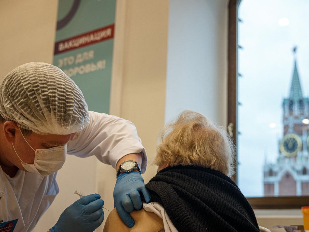 AA woman receives the Covid vaccine in Moscow. Picture: AFP