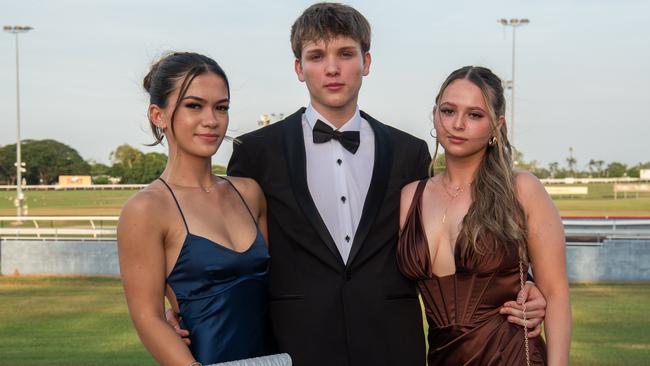 Chelsea Gass, Rebecca Hyde and Brodie Chatterton at the Taminmin College Year 12 School formal at Darwin Turf Club, 2024. Picture: Pema Tamang Pakhrin