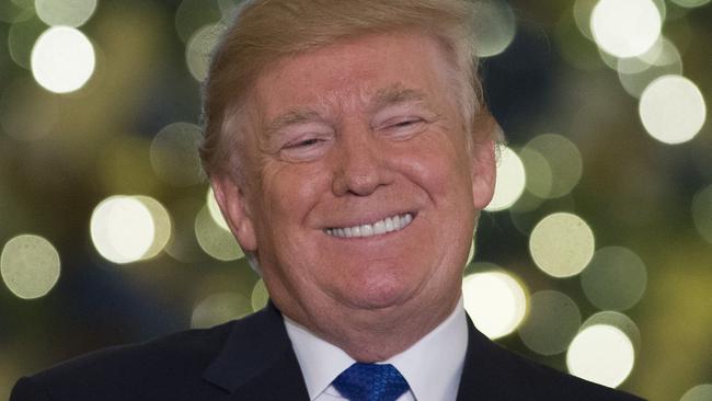 US President Donald Trump talks about the tax reform legislation in the Grand Foyer of the White House in Washington. Picture: Saul Loeb/AFP