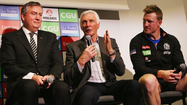 McGuire with Malthouse and current Magpies coach, and former club champion, Nathan Buckley. Picture: Michael Dodge/Getty Images