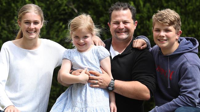 Pride of Australia entrant and police investigator Simon Gillard at home with his children Lily, Adella and Cooper in Wahroonga, Sydney. Picture: Brett Costello