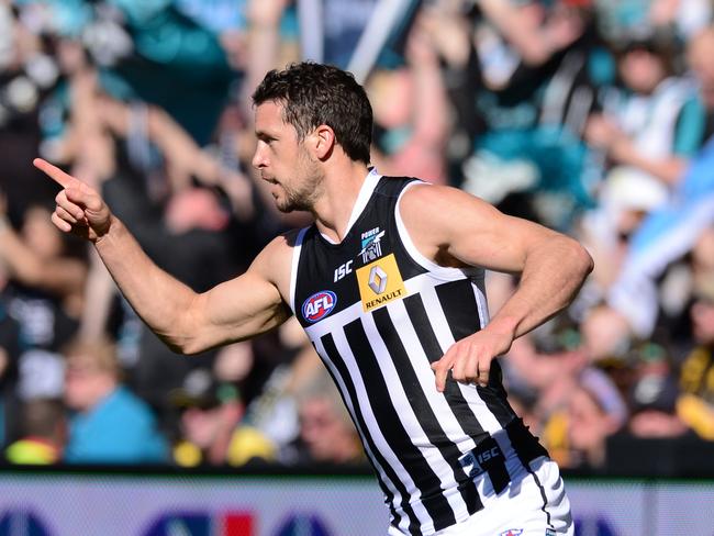 Port Adelaide’s Travis Boak celebrates a goal wearing the traditional prison bars jumper back in 2014. Picture: Mark Brake