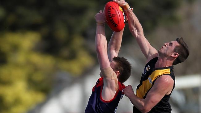 Bungaree’s Joel Mahar playing in the 2014 grand final as he tries to take a mark. Picture: Yuri Kouzmin