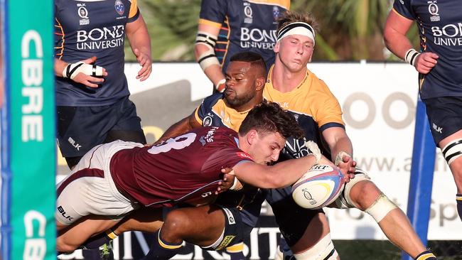 Pat Morrey scoring for Uni. Photo: Richard Gosling