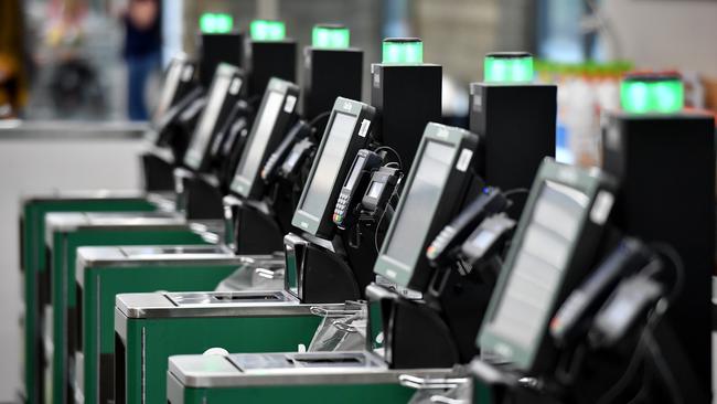 Self service checkouts at a Woolworths store in Sydney, Tuesday, Aug. 15, 2017. (AAP Image/Joel Carrett) NO ARCHIVING