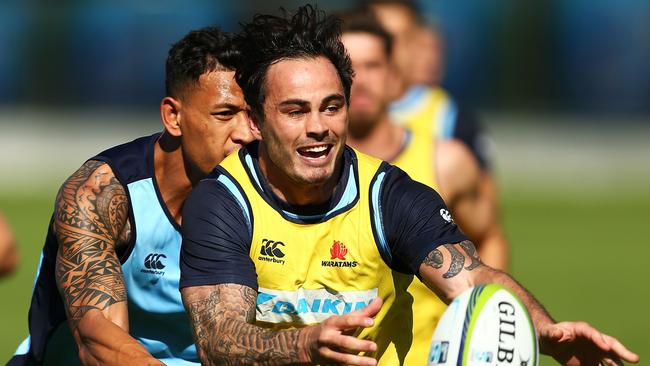 Zac Guildford passes the ball during a Waratahs training session at Moore Park on May 12, 2016 in Sydney, Australia.