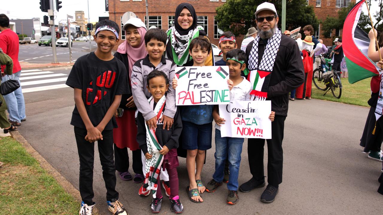 Adorned in red, white, green and black a group of around 80 people holding Palestinian signs and flags stood at the Hume and Margaret St corner of Queen’s Park and showed their support for an immediate ceasefire in Gaza. Saturday, March 23, 2024. Picture: Christine Schindler