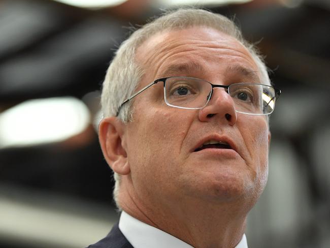 SYDNEY, AUSTRALIA - NewsWire Photos MARCH, 12, 2021: Prime Minister Scott Morrison speaks to media during a visit to a Phil Gilbert Motor Group Kia dealership in Sydney. Picture: NCA NewsWire/Joel Carrett