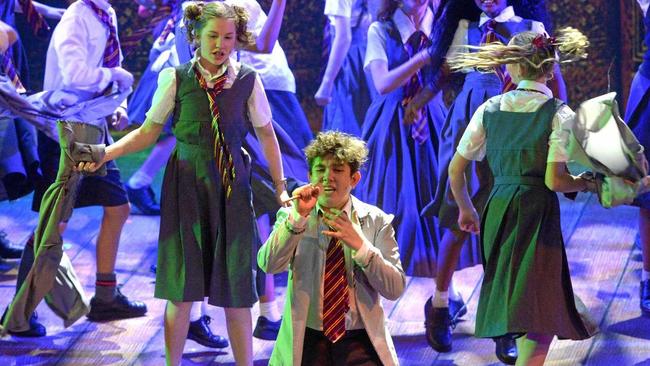 Bruce (Fynn Moran) channels his inner rock god in Matilda. Picture: Jann Houley