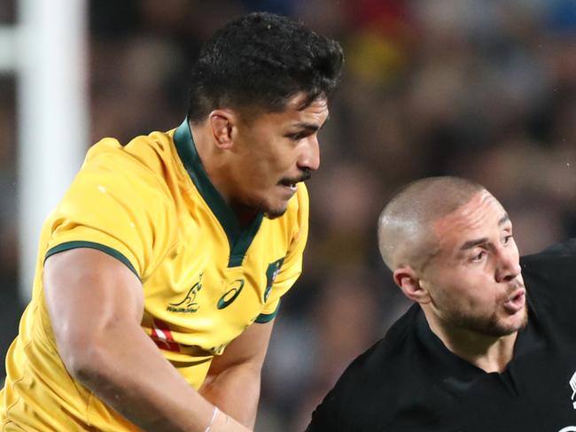 TJ Perenara of New Zealand is tackled by Pete Samu of Australia during the second Bledisloe Cup match between New Zealand and Australia at Eden Park in Auckland, New Zealand, Saturday, August 25, 2018. (AAP Image/Peter Meecham) NO ARCHIVING, EDITORIAL USE ONLY