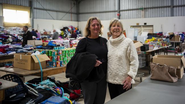 Sandy Reed and her mother Pat at the Cobargo Bushfire Relief Centre. Picture: Sean Davey.