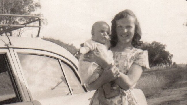 Gwen Grover holding her baby sister Sue, who was 19 years old at the time of her death in 1983. Picture: Supplied