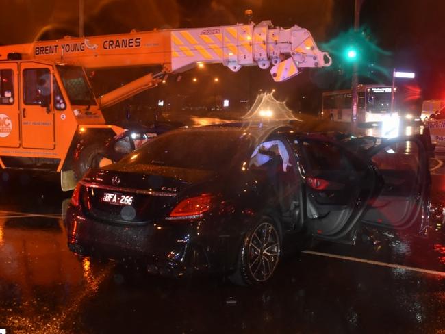 The stolen Mercedes collided with a crane truck.