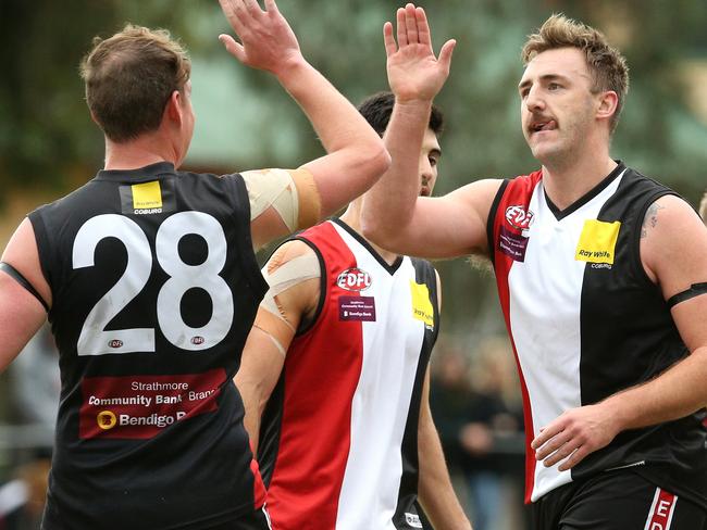 EDFL footy: West Coburg v Hillside: Lynden Dunn of West Coburg celebrates a goal with team matesSaturday, April 24, 2021, in Pascoe Vale South, Victoria, Australia. Picture: Hamish Blair