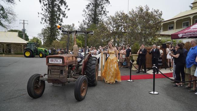 Students arriving in style for the 2024 Glasshouse Christian College formal at Flaxton Gardens.