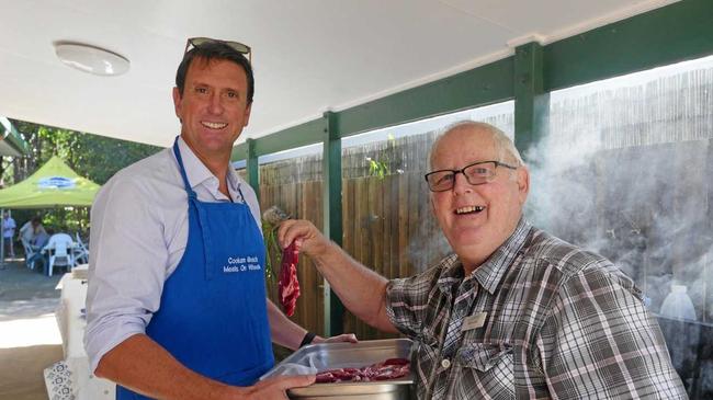 Coolum Meals on Wheels president Rob Cobb and local MP Dan Purdie at the barbecue. Picture: Lauren Thomson