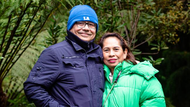 Queensland tourists Rafael and Erlie Santiago at the Royal Botanical Gardens, Hobart.Picture: Linda Higginson