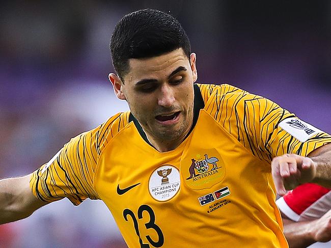 AL AIN, UNITED ARAB EMIRATES - JANUARY 06: Tom Rogic of Australia is challenged by Baha' Faisal of Jordan during the AFC Asian Cup Group B match between Australia and Jordan at Hazza Bin Zayed Stadium on January 06, 2019 in Al Ain, United Arab Emirates. (Photo by Francois Nel/Getty Images)