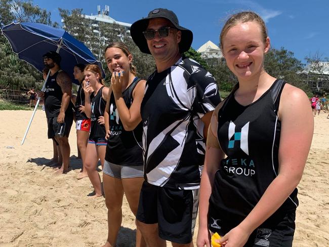 The Maroochydore Swans under-15s teammates of the late Saxony Walker have paid tribute to their friend. Saxony is pictured with Georgia Shuttleworth, Tilly Cason and coach Dom Mazzoleni.